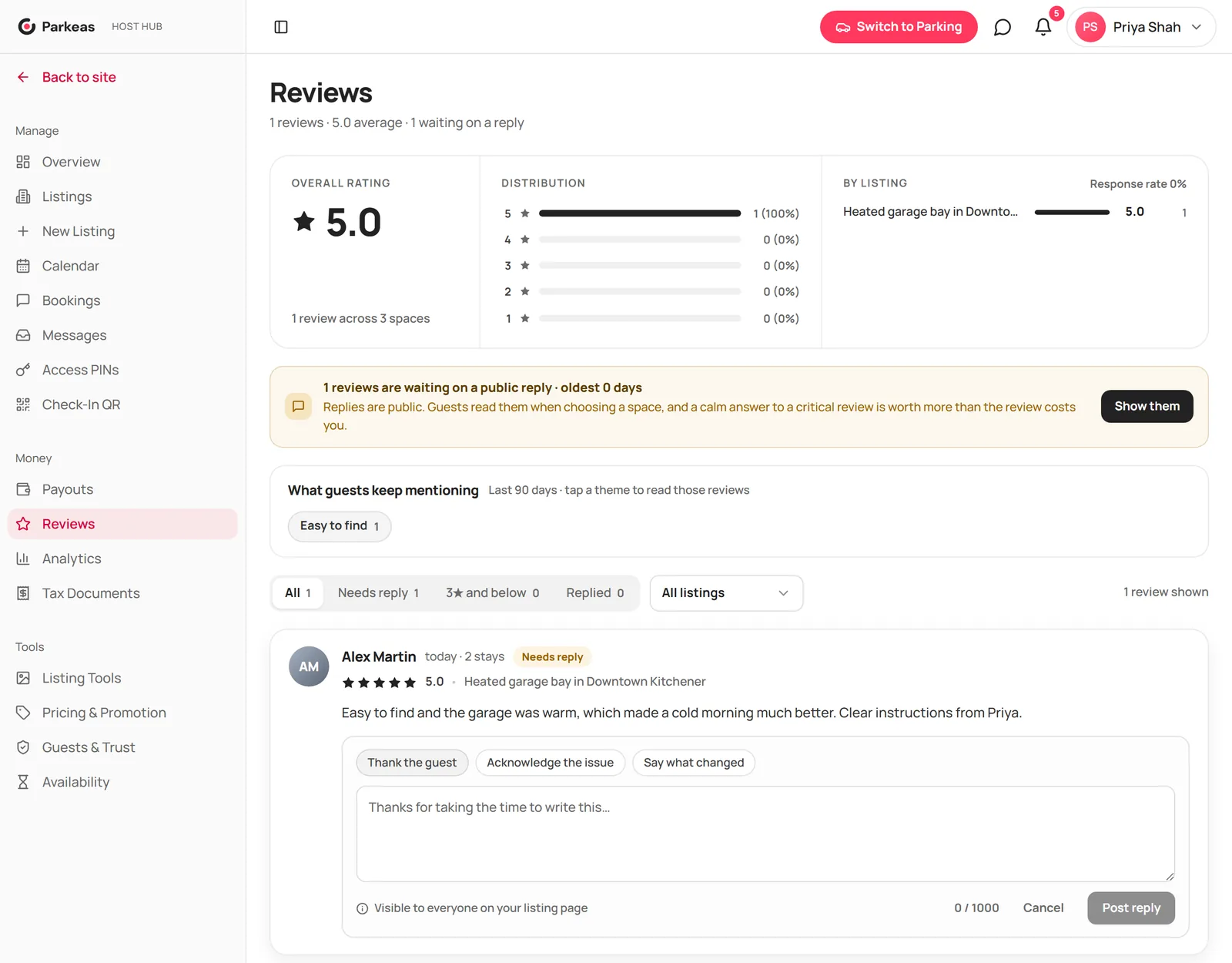 A review with the public reply box open and the Post reply button